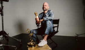 Photo of TFS President Andrew Barnsley with his Emmy and Golden Globe awards