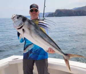 Andrew Dunning with rooster fish