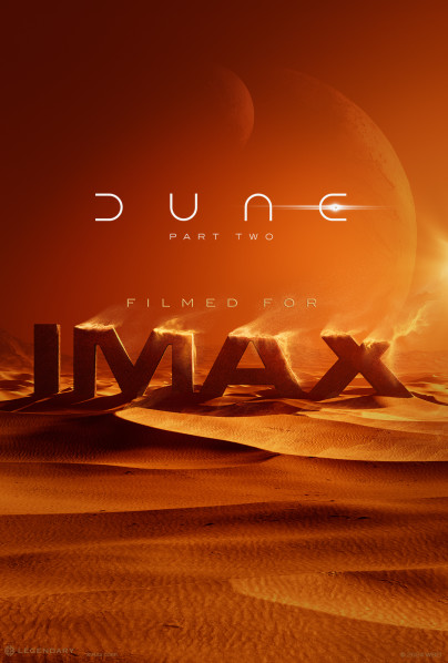 Picture of Movie poster Dune with a focus on the sand spelling out the word DUNE. 